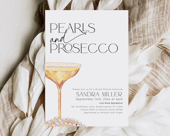 Elegant Pearls and Prosecco bridal shower invitation with champagne glass and pearls – fully editable digital template.